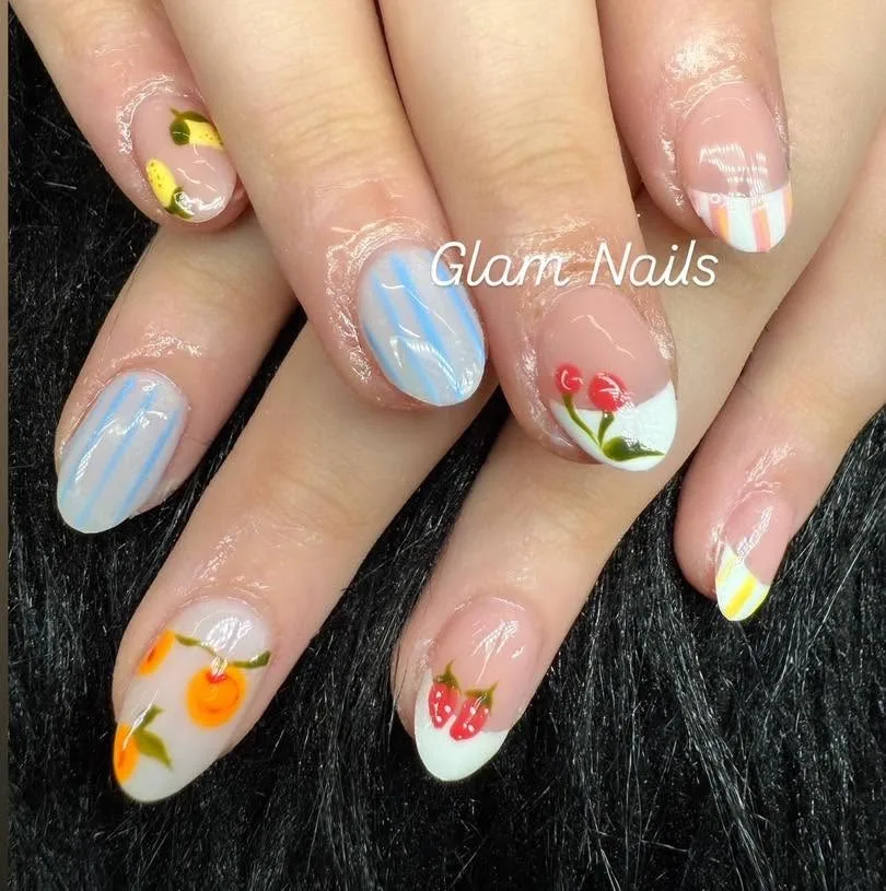 Short almond nails with lemon, cherry and strawberry fruit designs